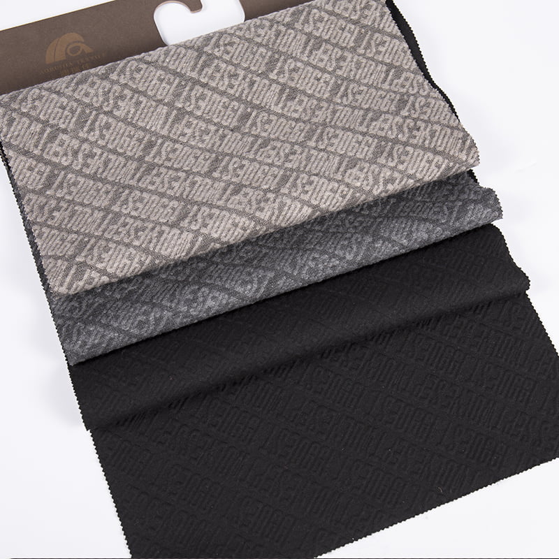 ตัวอักษรลายนูนลายทแยงถัก Jacquard โพลีเอสเตอร์ลาย้เหนียวผ้าสแปนเด็กซ์ชุดกีฬาสำหรับเสื้อผ้า AW23016